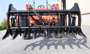 Clean up your property with a root grapple